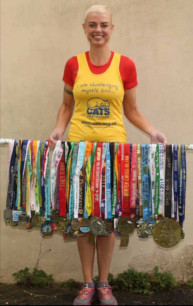 Emma with all her medals